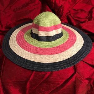 Swirling colorful summer/ beach straw hat.